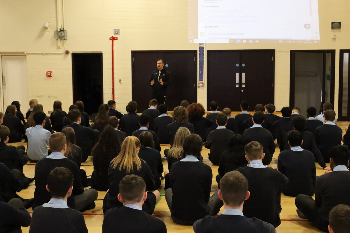 Image of Mr Gray talks to year 10 pupils about work experience